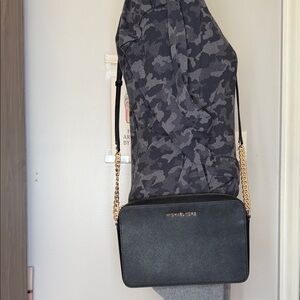 Michael Kors’s NWOT luxury leather black Crossbody bag w/gold hardware,